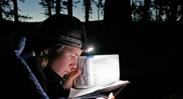 Reading the Pacific Crest Trail guidebook. Photo by Philipp Kobel