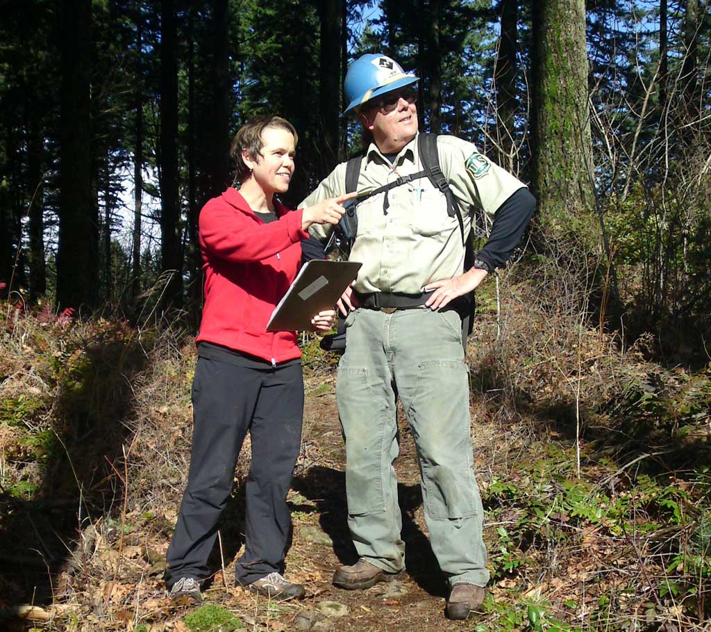 PCTA Regional Representative Dana Hendricks and late USFS trail champion Jim Proctor acting out management decisions for the camera.