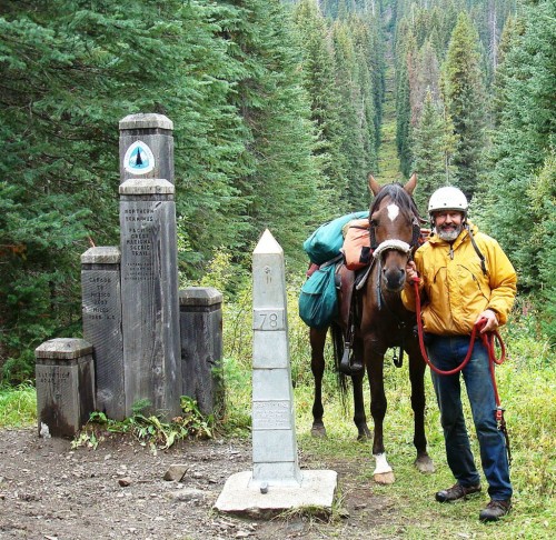 Ed "MendoRider" Anderson at the northern terminus of the PCT with his horse Primo.