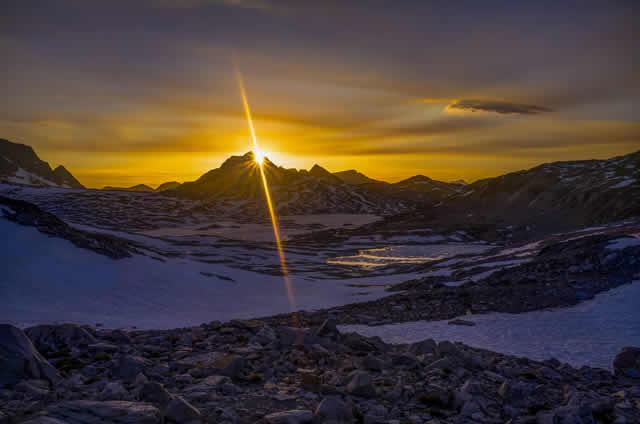 2013 Photo Contest - Trail Majesty - First Place I witnessed this spectacular sunset from the front steps of the Muir Hut in late May. Lake McDermand and Wanda Lake are visible in the background. Photo by: Vit Hradecky