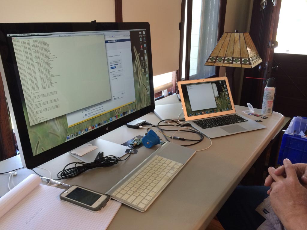 Here, we are flashing the Geo logger with the program that we have been working on for the last six weeks. Turns out that we produced well over 20,000 lines of code that reside in the Logger and the iPhone.