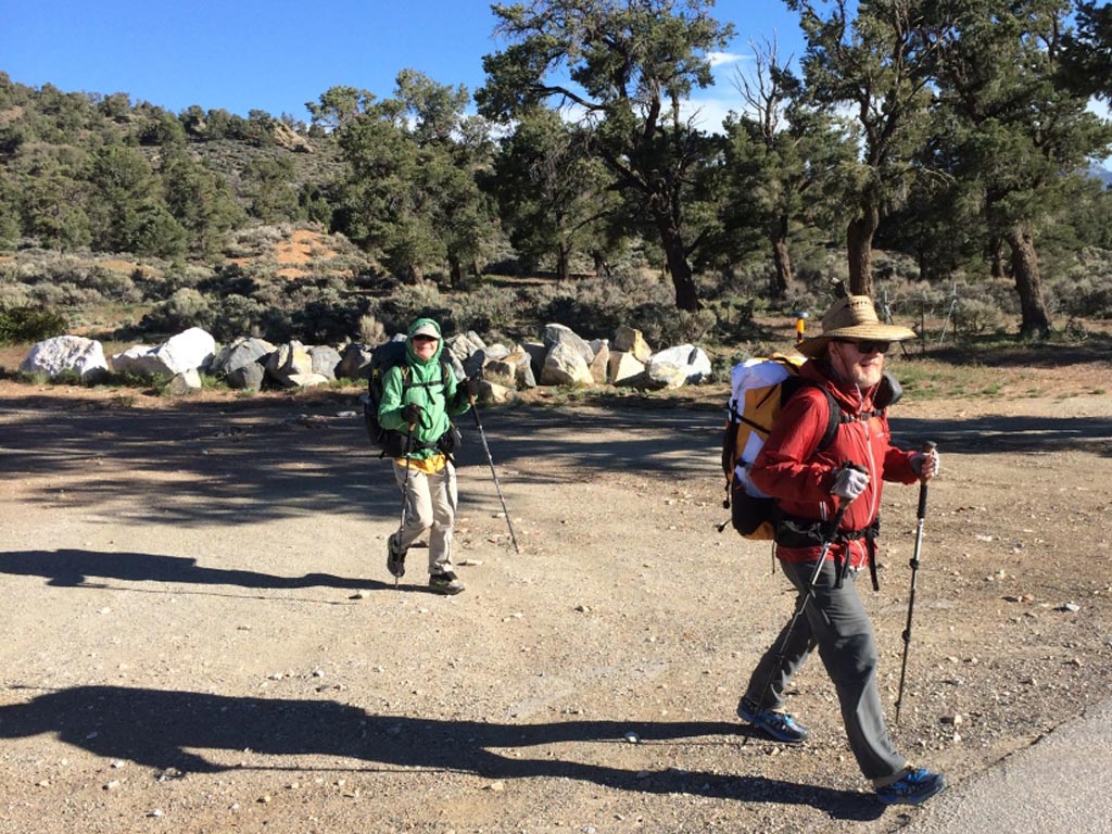 Halfmile and Debbie, leaving the Junction at Highway 18 at Big Bear for the next leg of their hike. Notice that the GPS Antenna is almost perfectly level (a requirement for high accuracy).