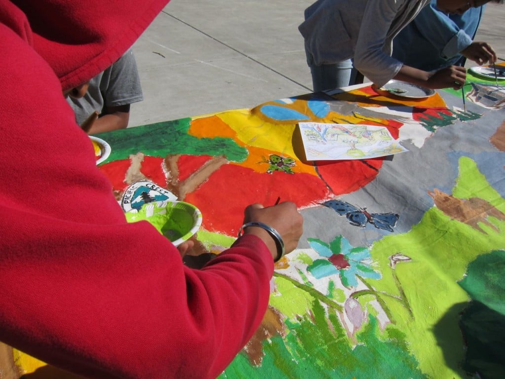 Painting the Pacific Crest Trail mural.