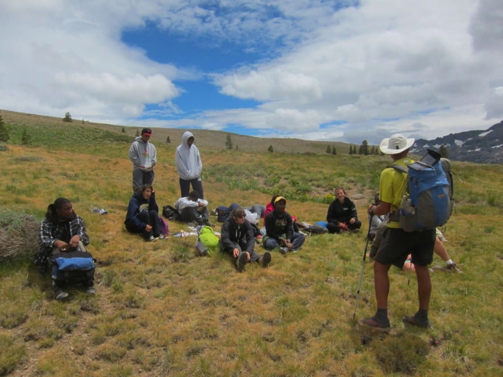 Taking a lunch break and hearing stories from a passing thru-hiker. 