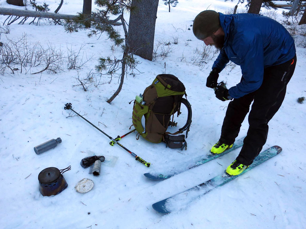 The brutal act of needing to heat up water over an alcohol stove in order to de-ice your ski binding.