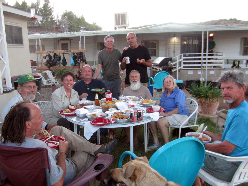 The Saufleys and Hiker Heaven volunteers enjoy a meal on the lawn. Donna is third from left and Jeff is standing at right. Donna called them the “best volunteers in the world.”