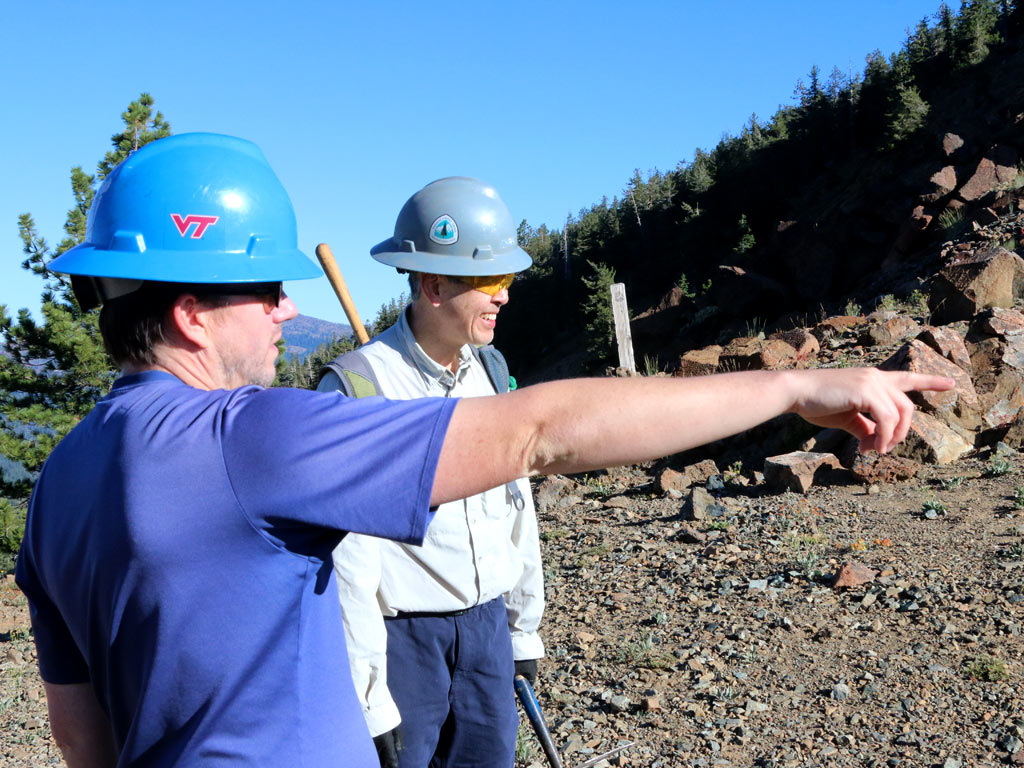PCTA Regional Representative Ian Nelson shows volunteer Gary Lee the lay of the land.