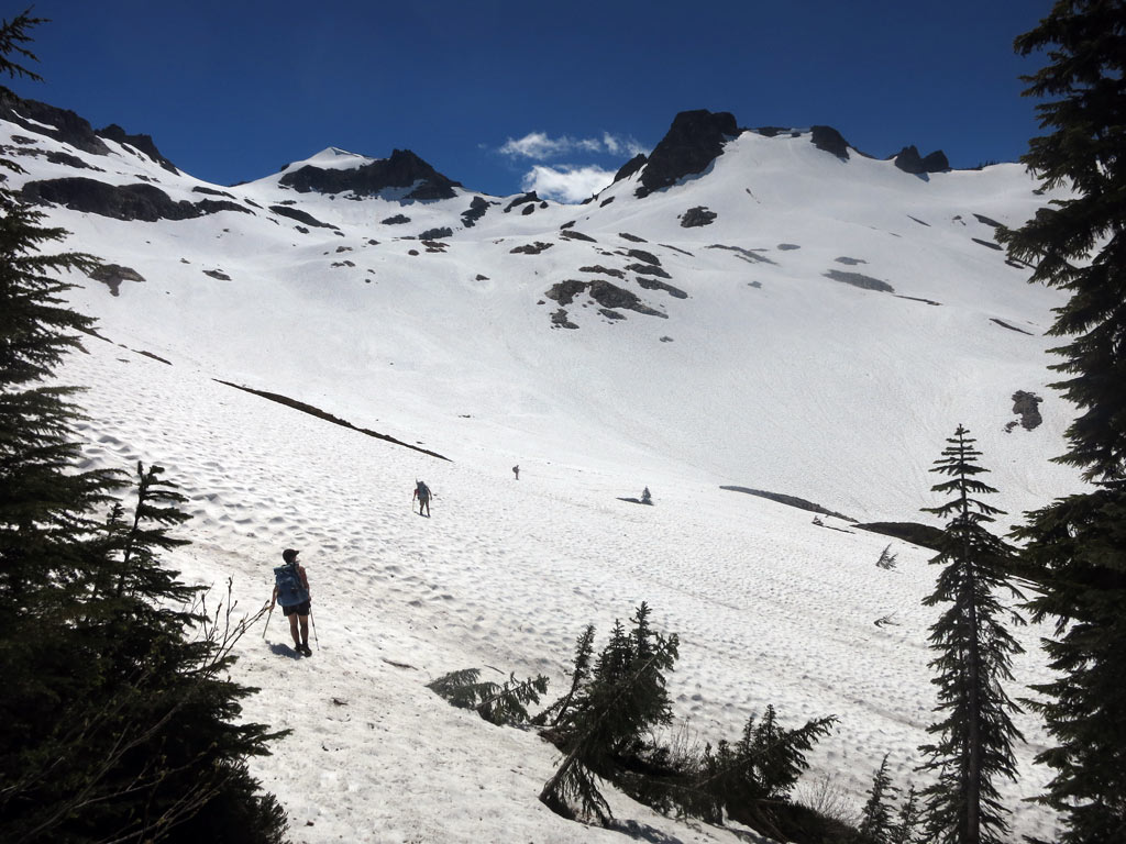 Crossing a snowfield in the Glacier Peak Wilderness in mid-July 2014. Photo by John Haffner.