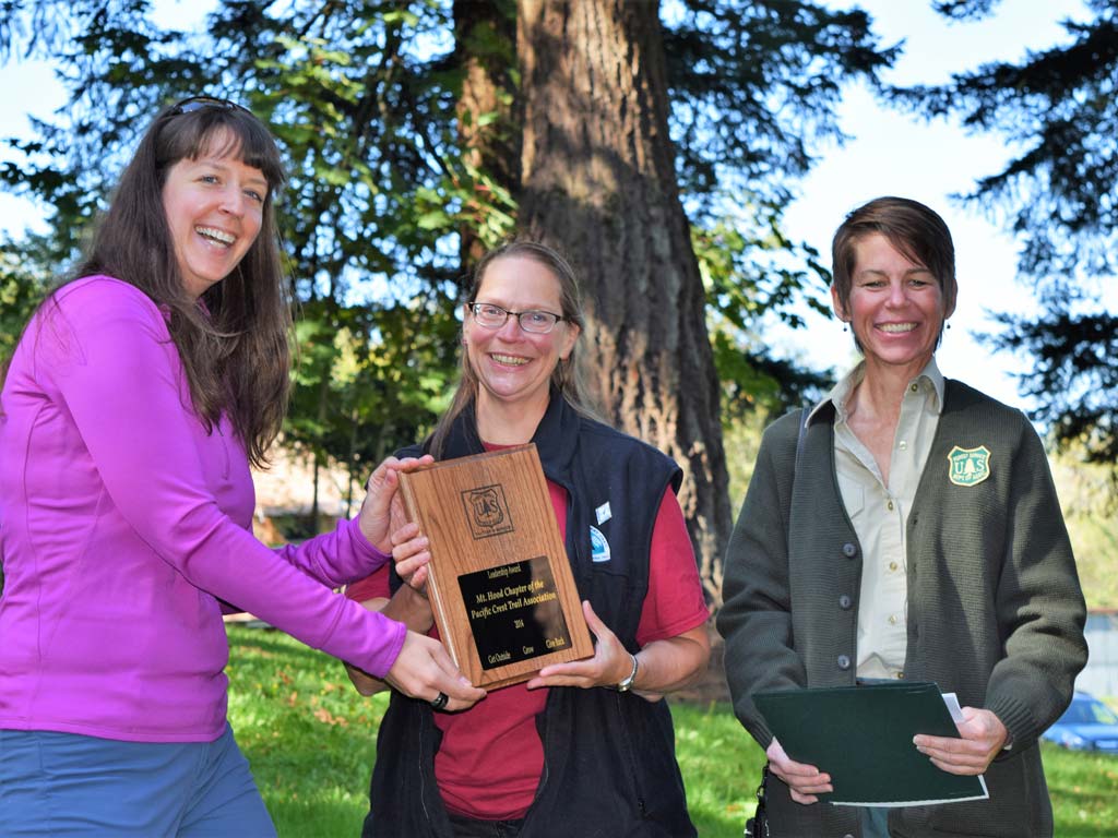  Jennifer Wade & Lisa Northrop present the 2014 Forest Service Volunteers & Service Leadership Award to Mt. Hood Chapter Chair, Roberta Cobb. Photo by Liz Marriott