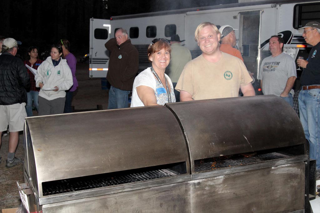 Riverside County Parks staff members tend the grill during the Friday night BBQ, hosted by Riverside County Parks.