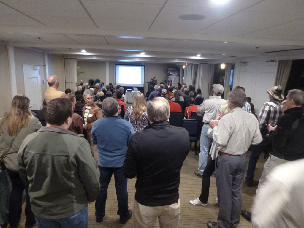 Liz Bergeron welcoming attendees at Trail Dirt Live.