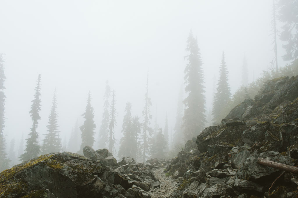 The Pacific Crest Trail disappears into the fog. Photo by Vincent Carabeo/Uphill Designs.