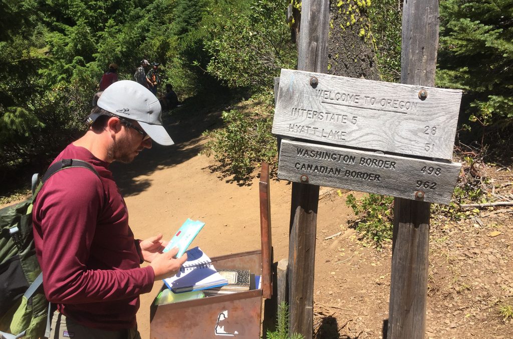 PCTA Regional Representative Ian Nelson on the Pacific Crest Trail at the California-Oregon border. The border is north of the Donomore Meadows property.