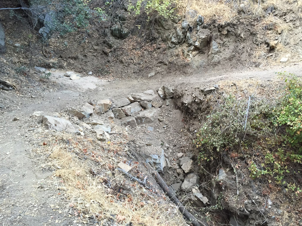 The rock retaining wall completed by the ACE corp crew. This photo really shows how we bury and hide much of our work. The trail should mostly pass by un-noticed while so that you can focus on the natural wonders around you. Photo by Connor Swift