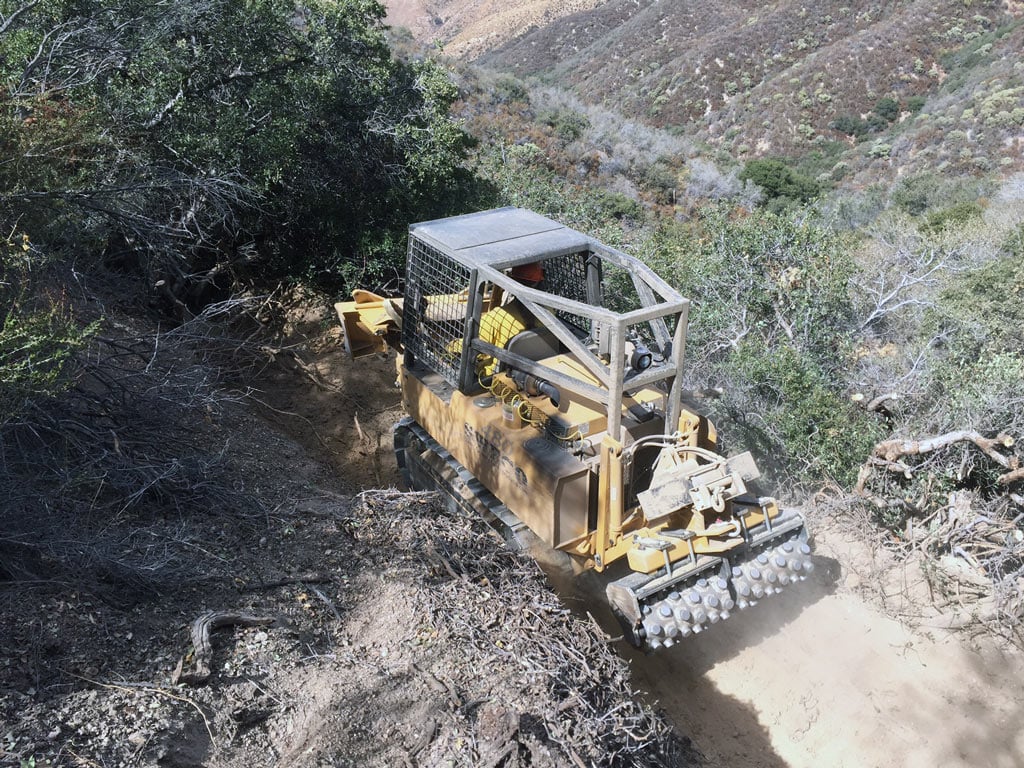 Sweco Trail Machine at work. These are rarely used on the PCT. Photo by Conner Swift