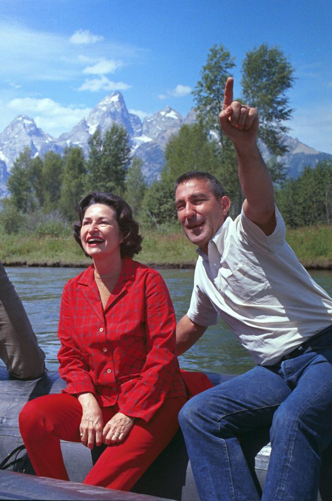 First Lady Claudia "Lady Bird" Johnson floats the Snake River near the Teton Range with Secretary of the Interior Stewart Udall. This 1964 raft trip helped influence President Lyndon Johnson's decision two years later to push legislation establishing the PCT as one of the first two national scenic trails.