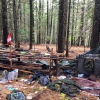 Forest Service personnel, joined by representatives of six federal and civilian partners, cleaned more than 6,000 lbs of trash and 7,000 lbs of irrigation pipes from an illegal marijuana cultivation site on the Lassen National Forest, Oct. 17-20, 2016. The site contained three large camps, numerous dumping locations and more than 1,250 lbs of fertilizer and pesticides. The cultivation operation was growing between 16,000 and 20,000 plants near the Pacific Crest Trail along Screwdriver Creek, a tributary of the Pit River which drains into the Shasta Lake Reservoir and the Sacramento River. Water diversion and contamination by pesticides from the site have adversely effected Screwdriver Creek. The Screwdriver Creek clean-up was part of a two-week operation, spearheaded by the Lassen National Forest, involving multiple grow sites. If the work being done were to be contracted, the cost would likely exceed $1 million. By managing the reclamation itself and enlisting help from partners, the Forest Service anticipated the cost to be closer to $250,000. Photo courtesy of U.S. Forest Service, Region 5