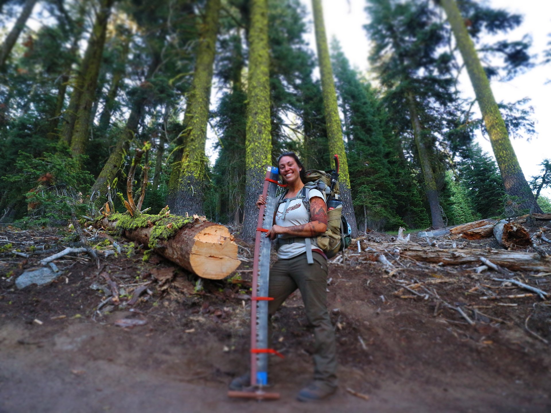 Former Trail Crew Technical Advisor Eleanore Anderson was all smiles with her crosscut saw.