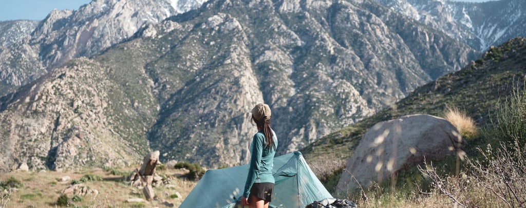 A hiker on the PCT looks at Mount San Jacinto.